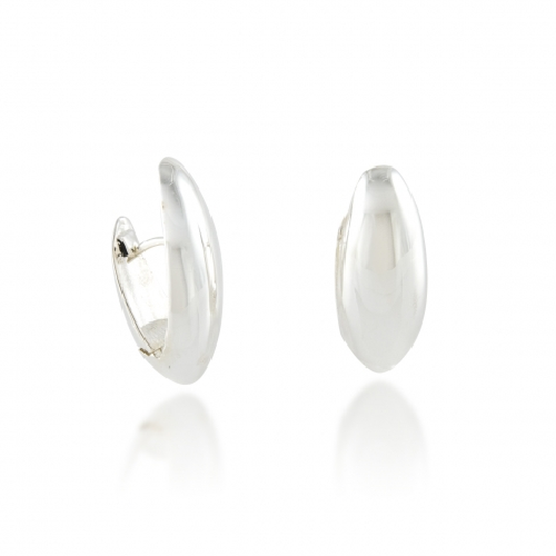 In 1989 Zina Sterling Silver moved into our Beverly Hills headquarters that accommodates our workshop as well as Zina 'The Store'. The store is a showcase for all that is 'today' in fine design in jewelry, gift ware, Judaica, frames and whatever Zina thinks is new and exciting that crosses her path. Zina is a destination for people seeking the finest in design . Zina is at the pulse of what is 'happening' Snap Hoop Earrings