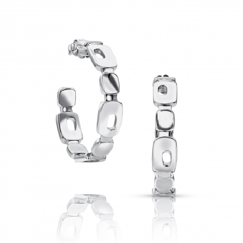 In 1989 Zina Sterling Silver moved into our Beverly Hills headquarters that accommodates our workshop as well as Zina 'The Store'. The store is a showcase for all that is 'today' in fine design in jewelry, gift ware, Judaica, frames and whatever Zina thinks is new and exciting that crosses her path. Zina is a destination for people seeking the finest in design . Zina is at the pulse of what is 'happening' Palm Springs Hoops Earrings