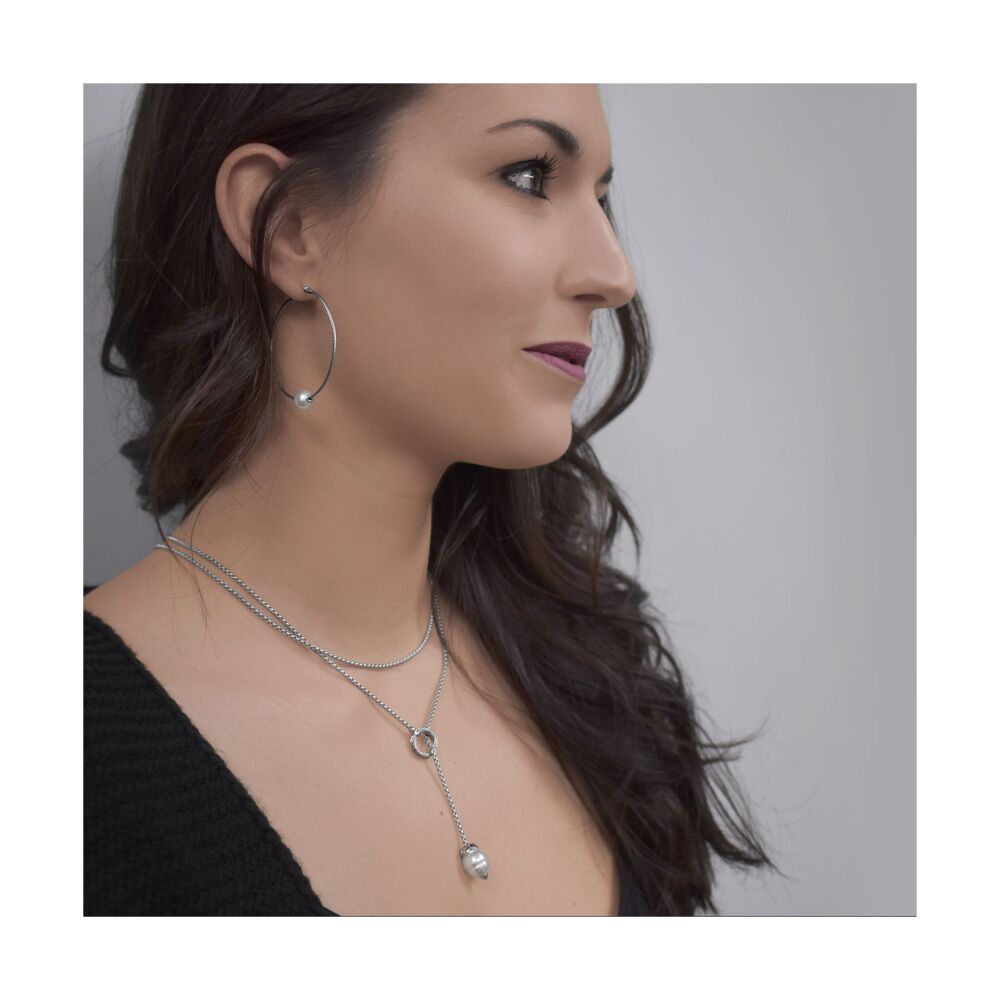 <div>These lightweight earrings feature Alor's signature heat treated stainless steel cable and are accented by a 6mm white freshwater pearl.</div><div><br></div><div><ul><li>Available in Grey or Yellow</li><li>18k Gold Post and Settings</li><li>6mm Freshwater Pearl</li><li>Lightweight</li><li>Closed Hoop Design</li></ul></div> Freshwater Pearl Cable Hoop Earrings