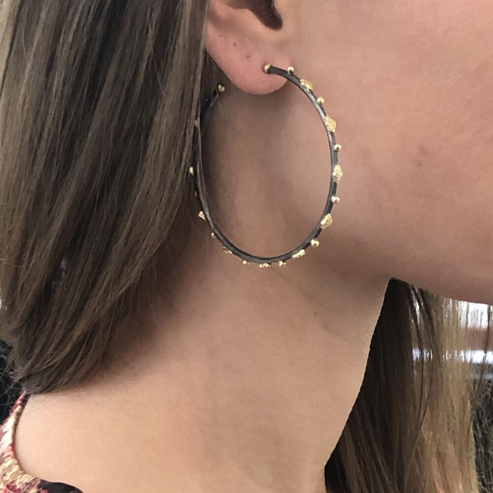 These Armenta hoops are absolutely perfect for hoop lovers. Blackened sterling silver and 18k yellow gold, make these so lightweight and pleasing to wear. Gold stations with set diamonds, give this piece something more to love. Old World Cravelli Crosses Large Hoop Earring With Diamonds