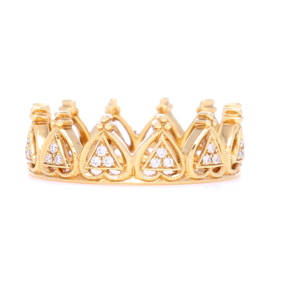 This stunning stack crown ring can easily be stacked up or worn alone. They also fit perfectly together if you purchase 2 of the same ring size. It's beautiful crown detail with negative space will easily spice up any stack ring set. Contains .14 carats of diamonds. All details based on a size 6.5
Size 6.5 in stock. 18k Yellow Gold and Diamond Beverley K Crown Ring