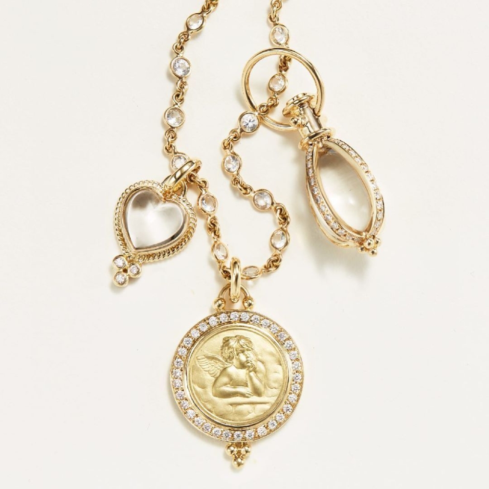 Image 2 for Small 18K yellow Gold Classic Amulet with oval rock crystal and Four sides of pave' diamonds.