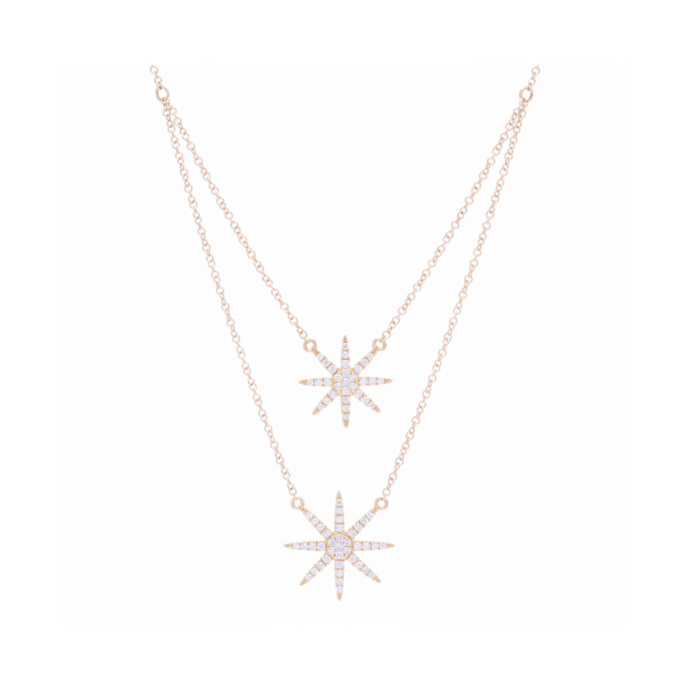 This elegant double drop diamond star necklace sparkles up the room. The longest star dangles at 18" . Total diamond weight is 0.25 tcw. Double Drop Star Necklace