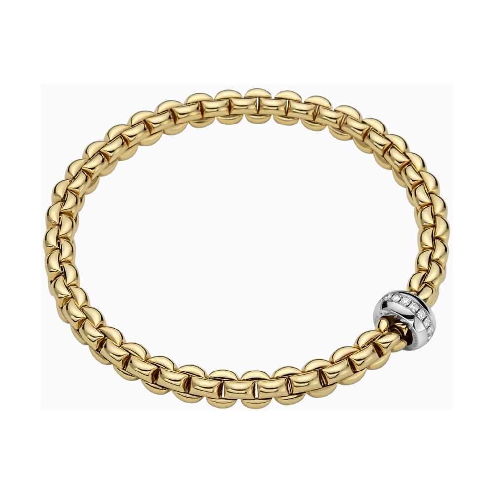 Eka – meaning ‘one’ in Sanskrit – is a whole new way of wearing gold bracelets.Based on one of Fope’s inventions from the 1950s, it applies the concept of flexibility to jewellery, blending together luxury and innovation. With its classic gold mesh design reworked in ultra-contemporary style, Flex’it has proved an instant global success.
The effortless simplicity of every Fope Bracelet ensures that you don't have to sacrifice your comfort for fashion. Classic yet fashion forward, this is most certainly not your grandmothers jewelry, e4ach piece of FOPE gives an aura of inteligence and sohistication to those who wear it.
Each bracelet has over 100 tiny 18k gold coils set into the interior of the link that allows the bracelet to expand and contract, rolling perfectly onto your wrist with ease. Handcrafted Entirely in Italy from 18k Gold and Diamonds, This Eka Flex'It Bracelet in size Small features a Single Line of Diamonds Rondel that sports 0.15cts of VS F/G Diamonds.
FOPE Flex'It Bracelets are made in Five Sizes - Extra Small(15cm.), Small(16cm.), Medium(17cm), Large(18cm), and Extra Large(19cm). Standard size is considered Size Medium and does fit most people. There are price differences between each size so please reach out to us for pricing information.
Size/Color Avaliable for Immediate Shippment is Size Small in Rose Gold with a White Gold and Diamond Rondel. All other sizes/colors will be ordered with a 4-6week lead time.
18k Gold Eka Flex'it Bracelet with Diamonds 721B BBR
