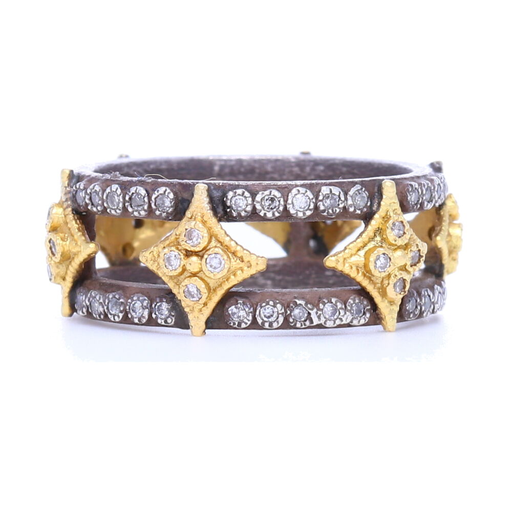 This blackened sterling silver double crivelli wide band comes with white and champagne diamonds. Perfect to stack up your finger, or to just wear alone. Double Band with Crivelli Ring