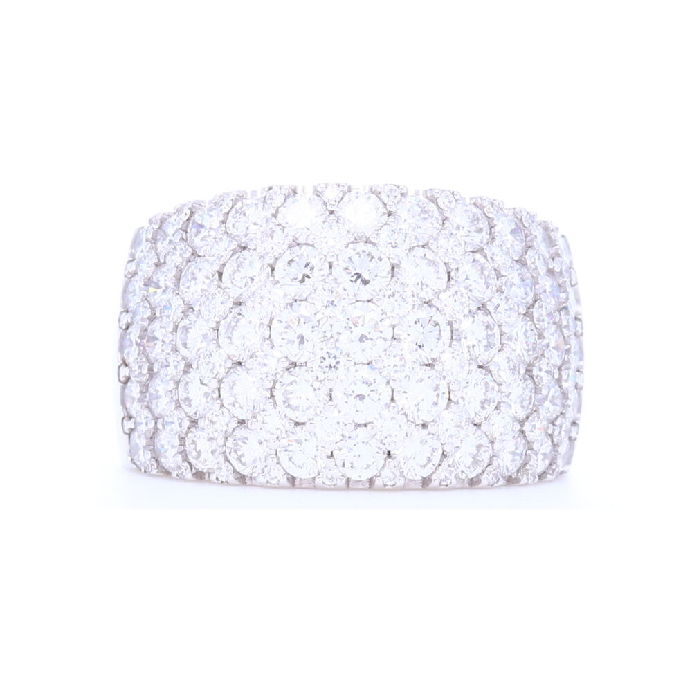 4.11 carats of diamonds set into 11.39 grams of 18k white gold makes this a statement ring. With the ability to be seen from space this ring will go down generations. Wide 18k White Gold Brilliant Cut Diamond Prong Set Ring