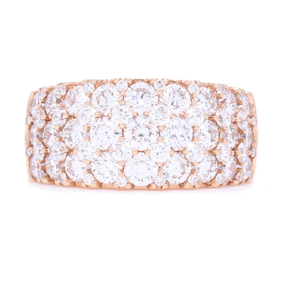 2.81 carats of brilliant cut diamonds set into 6.9 carats of heavy gold grams. This right hand ring is blinding and so comfortable to wear as it is very smooth between your fingers. You'll fall in love with the fit of this ring as you won't even know you don't have it on. Wide 18k Rose Gold Prong Set Brilliant Cut Diamond Ring