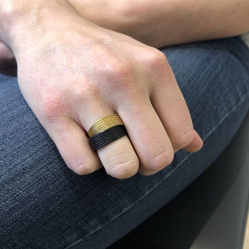 This heat treated black and yellow colored heat treated steel cable features 6 strands of each color, stacked one on top of another. Perfect for those who love to stack rings, or for someone looking for more of a statement. Noir & Yellow Stacked Ring