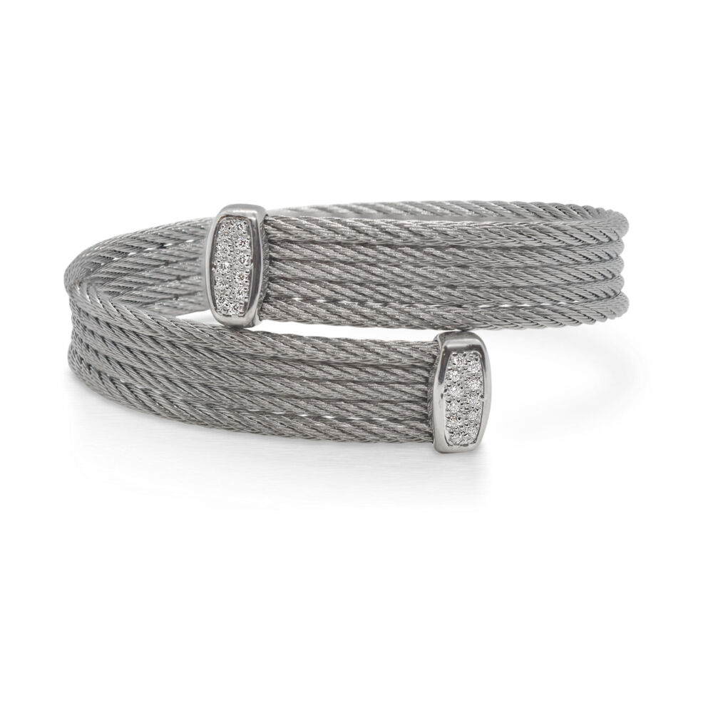 Grey cable, 18 karat White Gold, 0.18 total carat weight Diamonds and stainless steel. Imported. SKU: 04-32-S655-11 Cable Bypass Bracelet with 18k White Gold & Diamonds