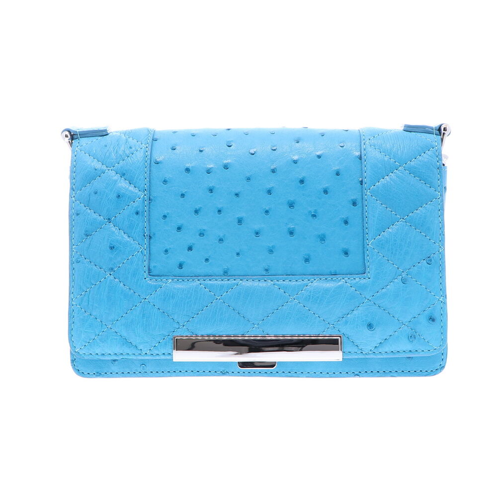 LaNae’s Chain Bag is an over the shoulder, crossbody chain bag made from genuine Python leather. Proudly handcrafted in the United States by 3rd generation artisans, all edges are hand painted, the interior is lined with garment quality suede and is detailed with Italian palladium hardware. Each luxury bag is one of a kind and especially made for you to stand out against the crowd! Contact the store for additional photos. Turquoise Ostrich Chain Bag