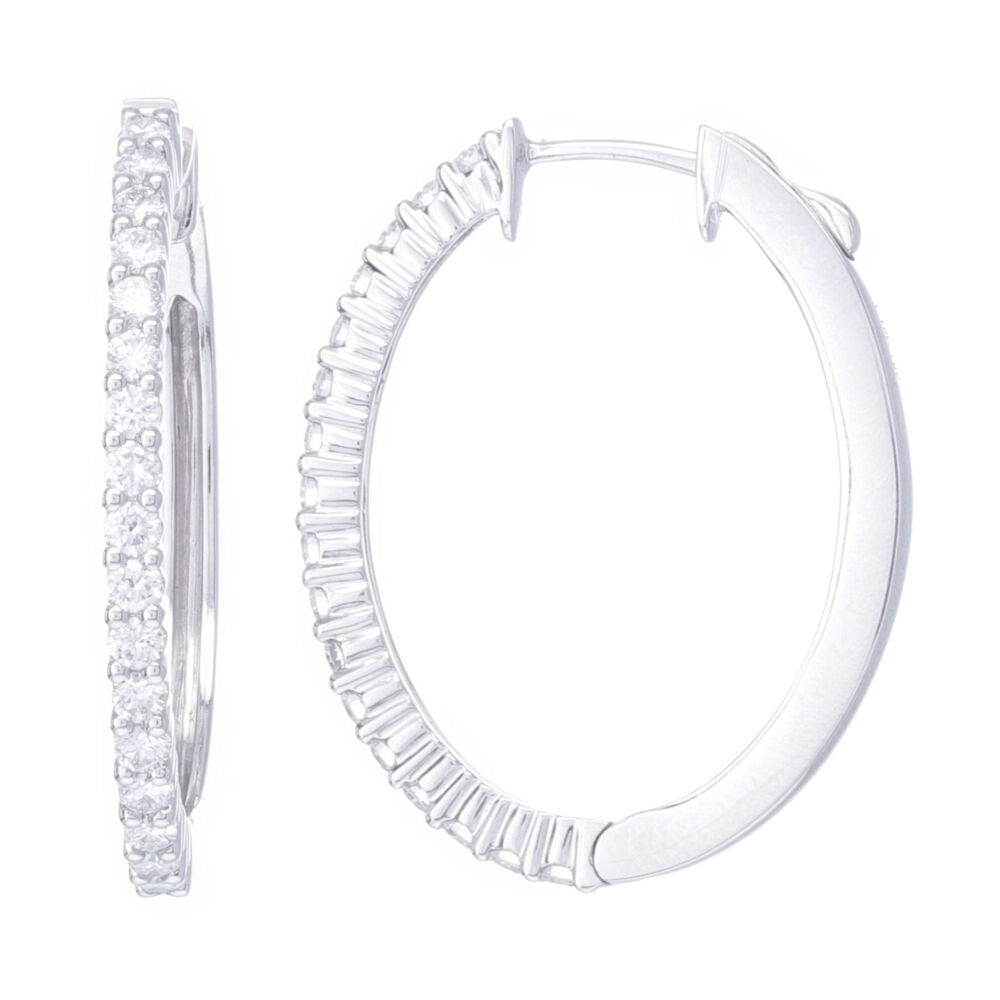 0.89 carats of diamonds are set into 5.9 grams of 18k white gold for a stunning earring that you can wear every day. 18k White Gold Diamond Hoop Earrings
