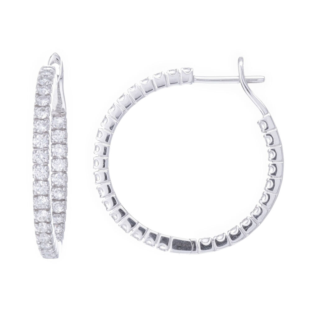 These stunning 18k white gold inside outside prong set diamond hoops have 1.33 total carat weight and are set in 5.83 grams of gold. Perfect for every day wear. 18k White Gold Prong Set Diamond Inside Outside Hoop Earrings