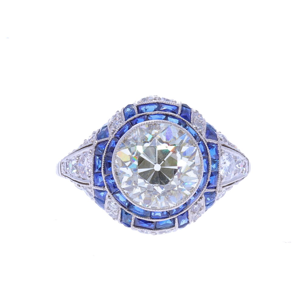 Platinum Art Deco 2.90 OEC Diamonds surrounded by 0.75tcw side diamonds and French cut Sapphires 2.90ct Diamond Ring With French Cut Sapphire and Diamond Surround