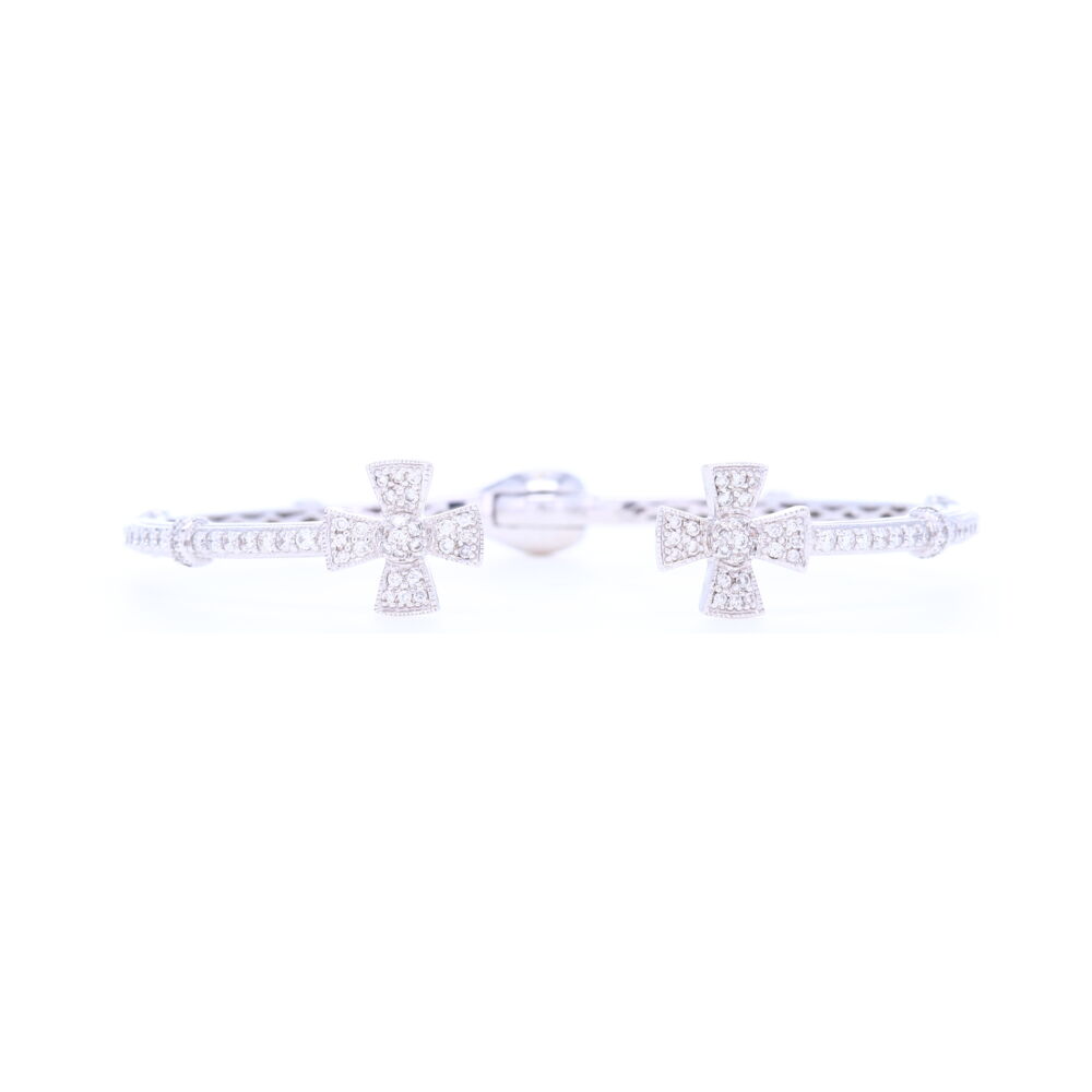 This 18k white gold diamond maltese cross is a great chunky cuff bracelet that is perfect of any occasion. Since this is an open cuff, this unique bracelet can fit up to an 8 inch wrist. This 1.65 carat diamond cuff bracelet can either be stacked or worn on its own, but either way, it is sure to shine. 18k White Gold Diamond Maltese Cross Open Cuff