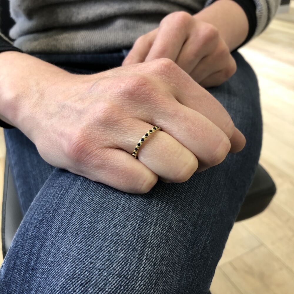 This 18k yellow gold ring features an infinity of black sapphires baguettes. Stack this high with others or keep it simple and wear alone. Old World 18k Black Sapphire Ring