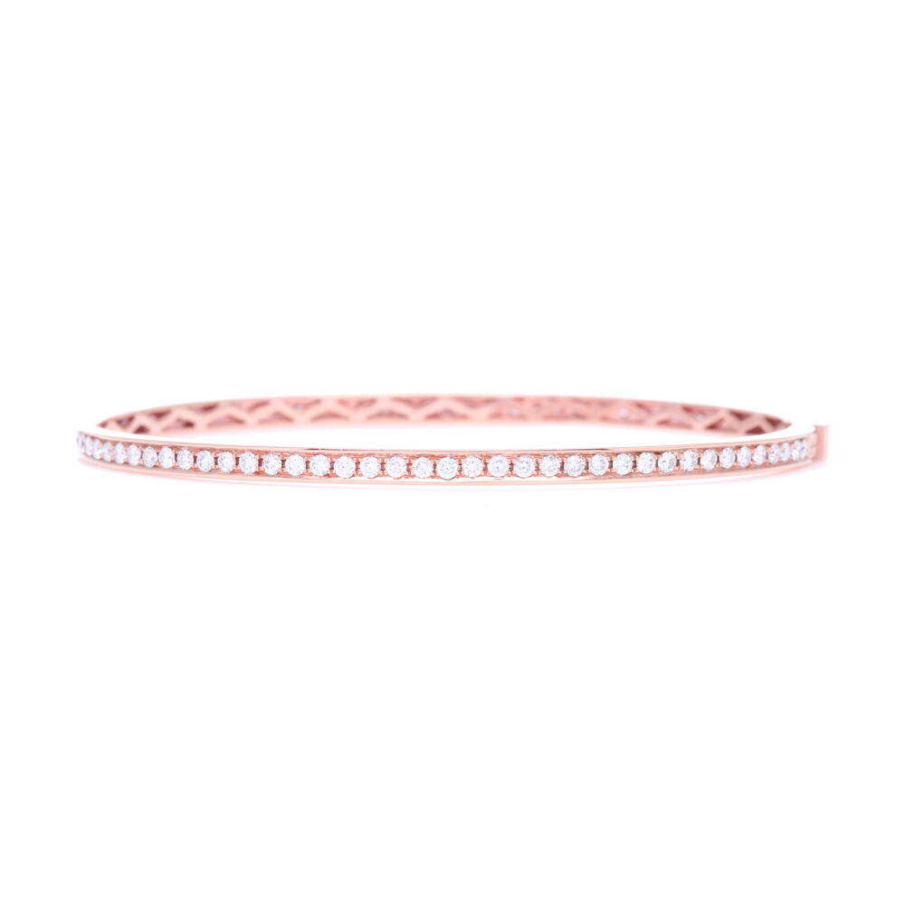 This gorgeous 18k Rose Gold bracelet has 1.51 total carats of Diamond. The diamonds are prong set and wrap around the whole bracelet. Rose Gold Diamond Eternity Bracelet