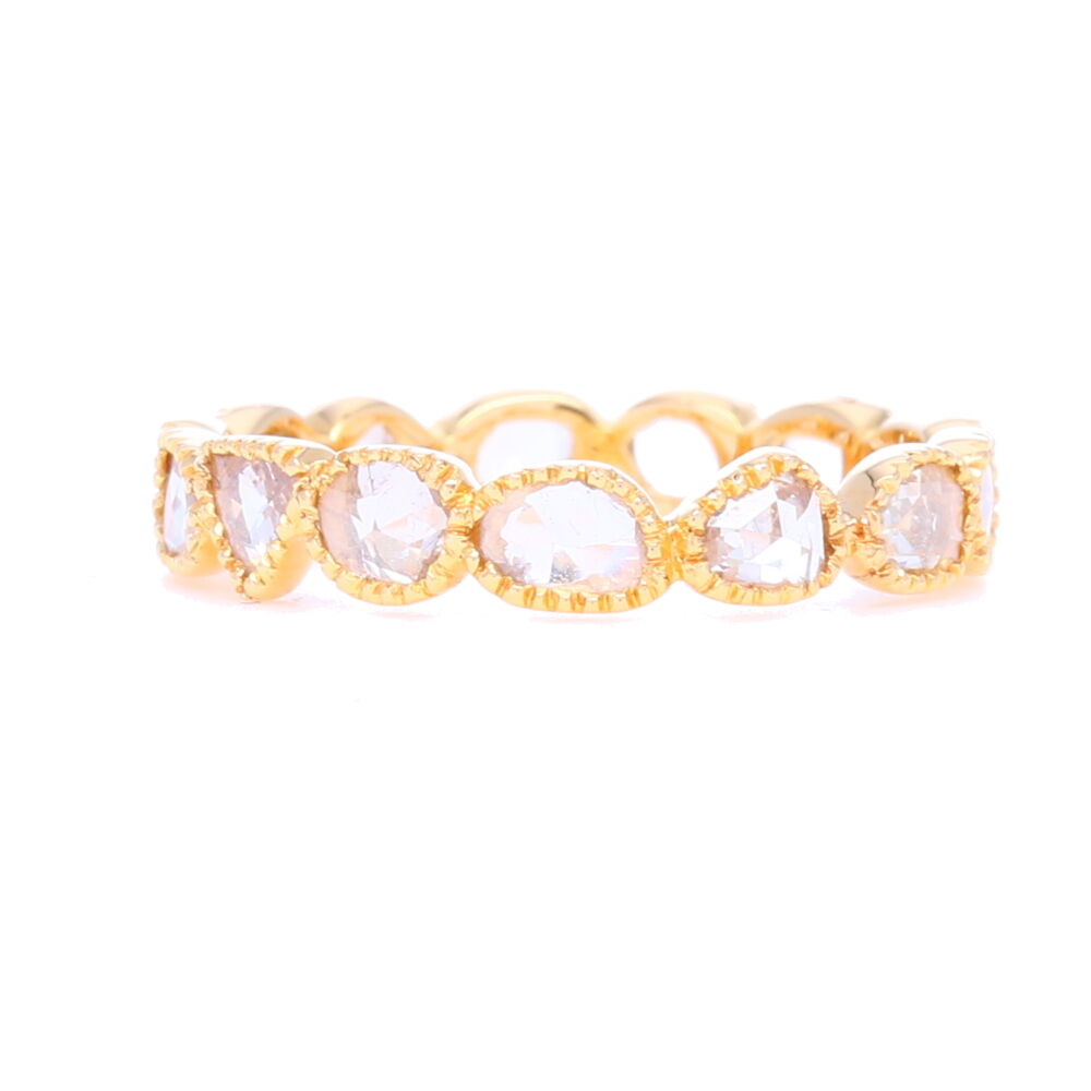 We love rough cut diamonds and especially when they are set in a way to show off the abstract cut. Set in 2.02 grams of 18k yellow gold as to not overpower the 1.05 carats of diamonds in this stunner. Not your every day stack ring, this adds tons of dimension to an existing stack set. "Maya" Rough Cut Bezel Set Diamond Stack Ring