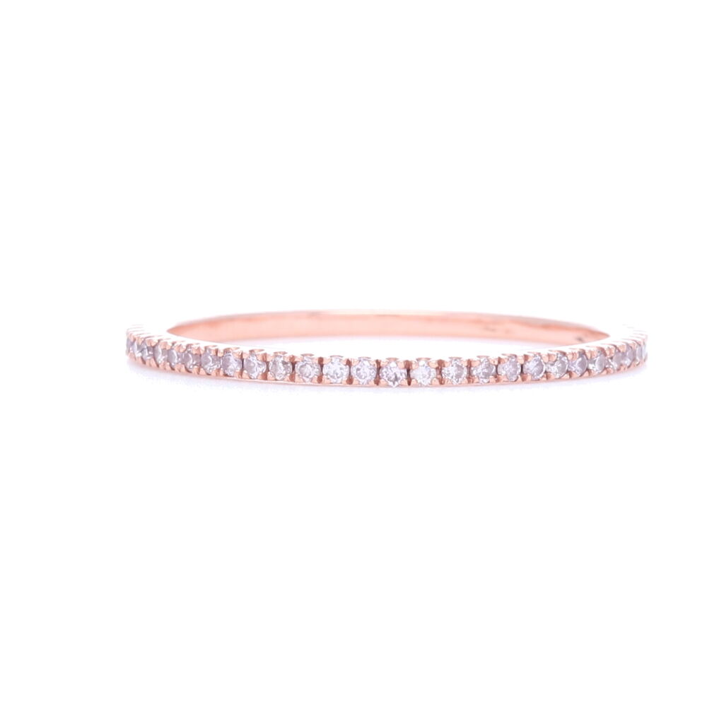 This 18k rose gold ring is perfect for any jewelry lovers collection. This ring has .35 carats of prong set pink diamonds and can be worn either stacked or on its own. This elegant and classic ring can be worn for a night out on the town or everyday, but either way it will stand the tests of time. 18k Rose Gold Pink Diamond Ring
