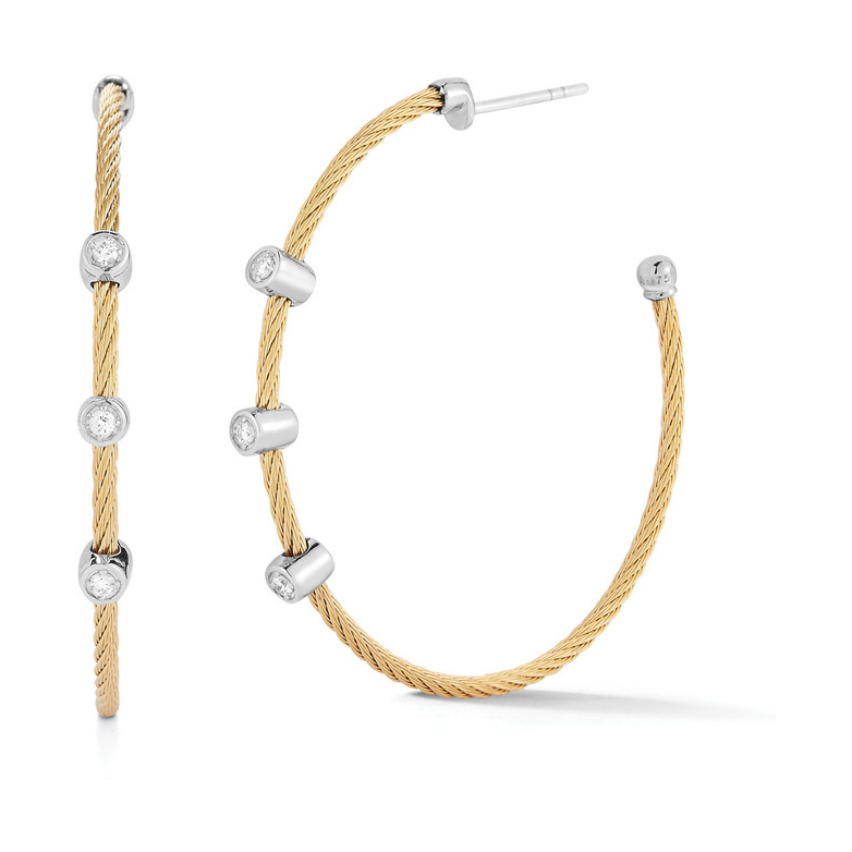 These noir heat treated twisted steel cable hoops feature three 18k white gold diamond stations. These lightweight hoops are perfect for everyday use, and transition into evening wear very nicely.<div><br></div><div><ul><li>Available in Black and Yellow</li><li>18k Gold Posts and Settings </li><li>0.12tcw of Diamond</li><li>Lightweight</li></ul></div> Three Diamond Station Twisted Cable Hoop Earrings