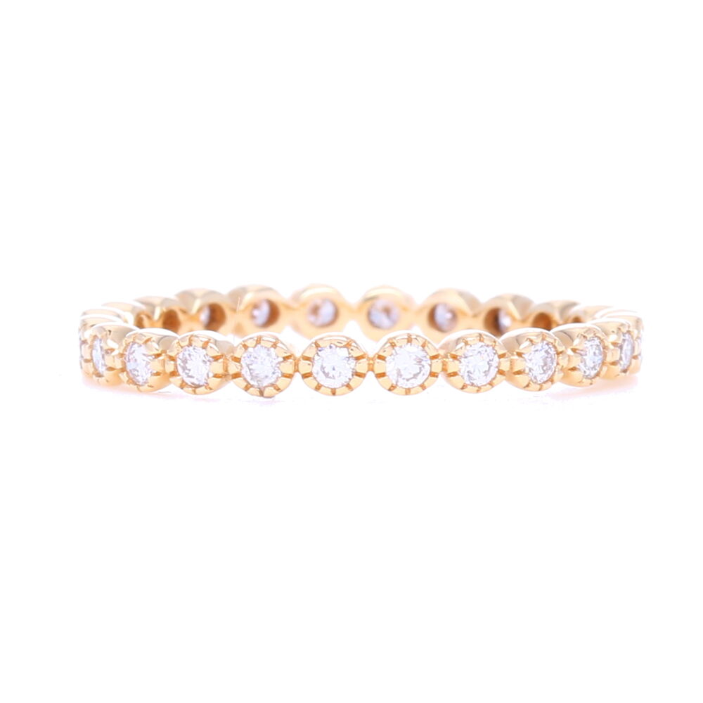 This size 6.5 brilliant cut bezel set diamond eternity stack ring looks amazing on it's own or mixed into your unique set of stack rings. This ring has .34 carats of diamonds and is set in 14k yellow gold. Inquire about other colors or other sizes, we'd love to accommodate you. 14K Yellow Gold Brilliant Cut Eternity Stack Ring