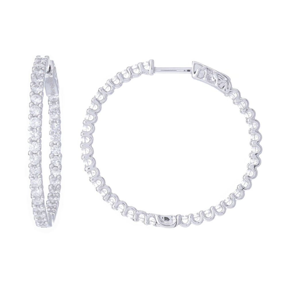These 14k white gold prong set inside outside hoop earrings are 1'' in size and is perfect for everyday wear. The total weight in diamonds is 1.5 carats, and means they sparkle, but aren't so loud that you can't easily wear with jeans and a t-shirt. Round Diamond Inside Outside Hoop Earrings