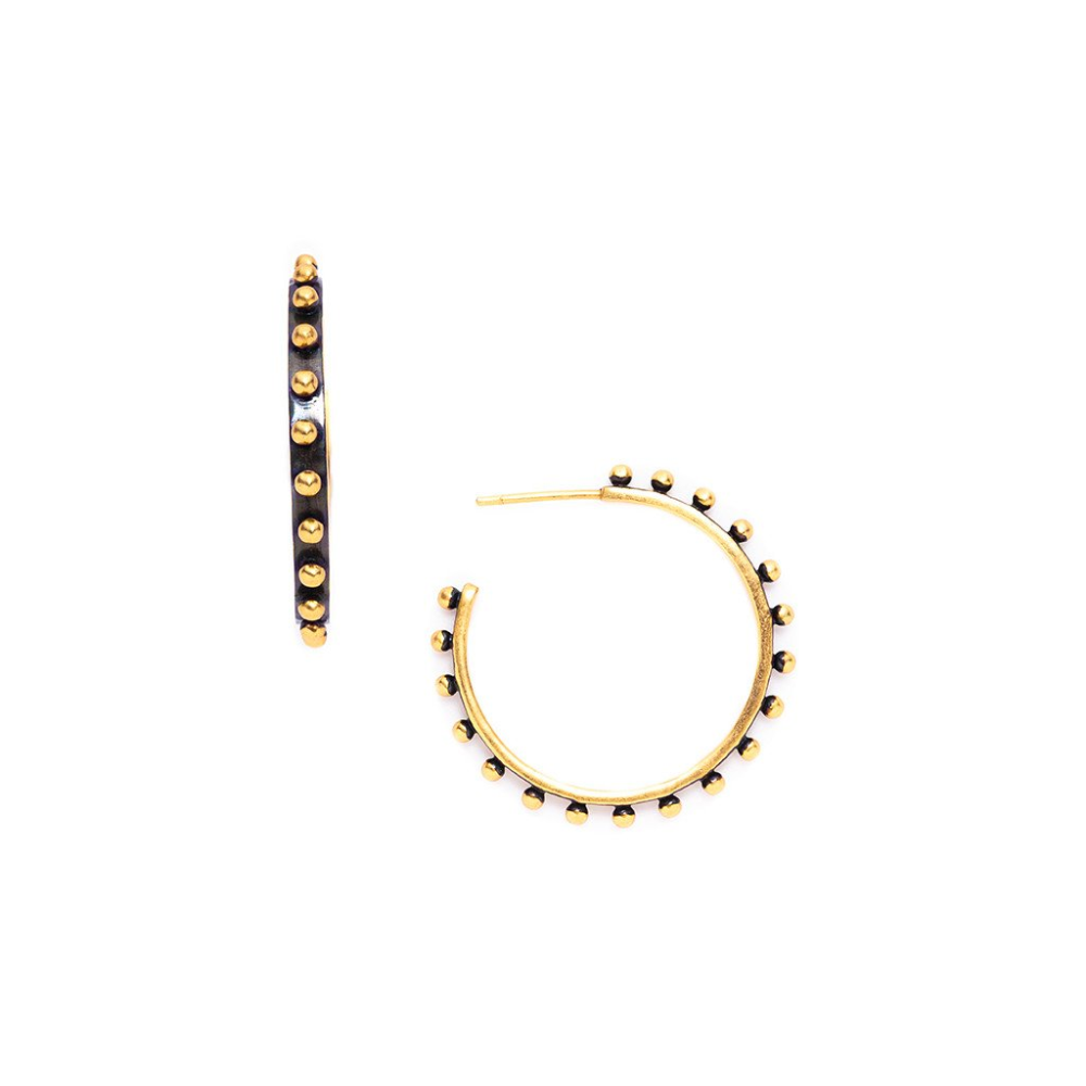 Available in either a brilliant mixed metal variant or entirely 24k gold plate finish, the Soho Hoop is a brilliant and impactful piece. Learn more about it: SoHo Hoop - Multi Tone
