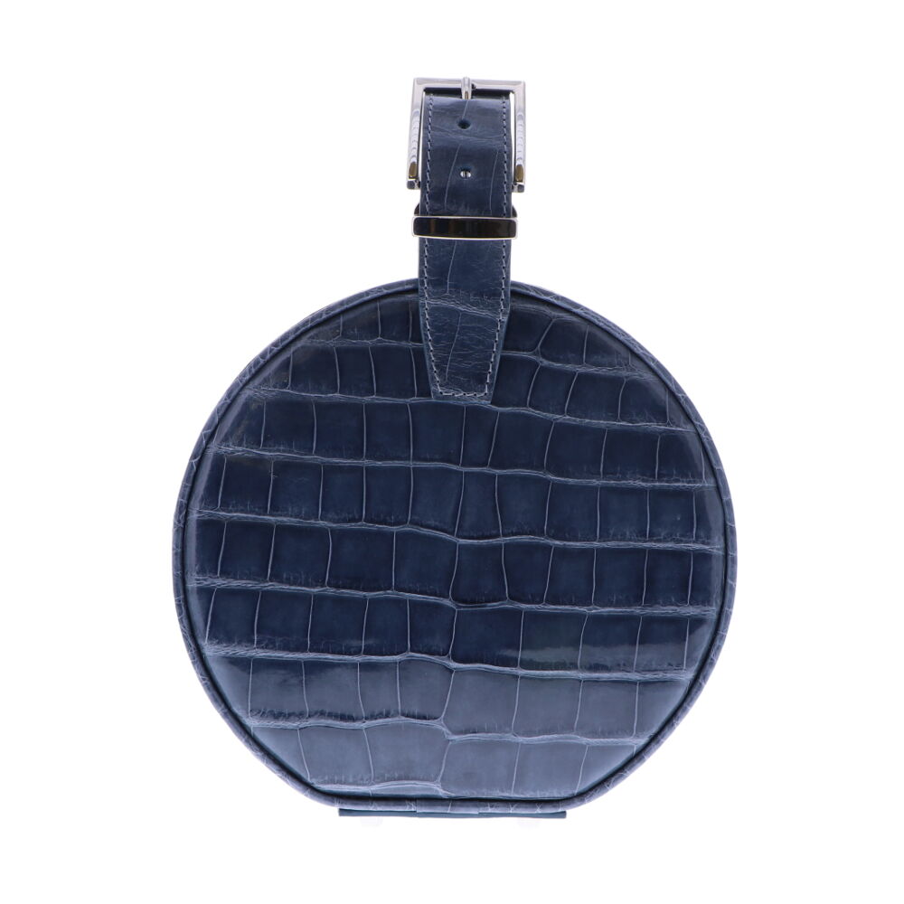 LaNae's Hat Box Chain Bag has been crafted out of genuine American Alligator with a premium High Gloss Steel Blue finish. Due to the premium quality of each high gloss skin our 3rd generation artisans are required to hand stitch each bag. As always our hardware is the finest Italian Palladium and each interior has been lined with a Garment Quality Suede which keeps each bag light yet durable. Proudly crafted in the United States. Hat Box Chain Bag - Slate Blue Alligator