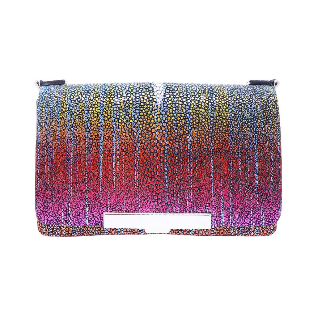 LaNae's Chain Bag has been crafted of genuine Stingray colored with a unique Purple Rainbow finish. Each handbag is crafted using the finest Italian Palladium Hardware including a magnetic closure as well as a chain and d-rings. The interiors are lined using a strong yet light garment quality suede. Each of LaNae's one of a kind bags have been proudly produced in the USA. Stingray Chain Bag Rainbow