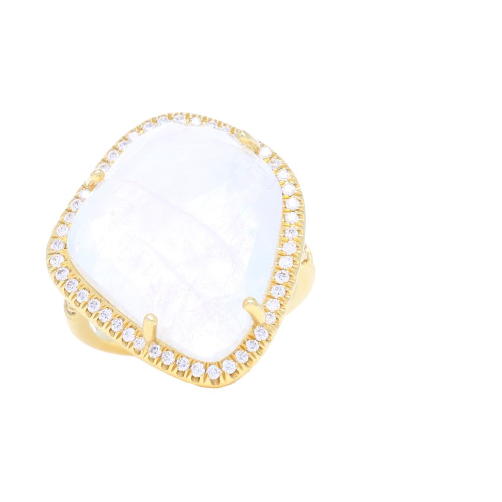 Raw cut moonstone steals the show of this abstract moonstone ring set in 18k yellow gold with a diamond halo. Each stone is hand picked by Lauren herself, looking specifically for unique, one-of-a-kind stones that are far from common. This stone blends right in with whatever you're wearing, truly a statement ring that can pass as an every day right hand ring. 18k Abstract Moonstone Ring