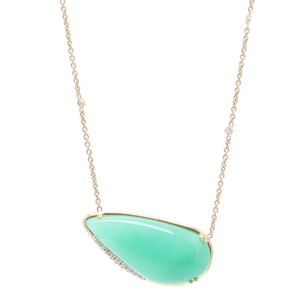 Looking for not your every day color - this abstract shape aqua chalcedony with diamond details in just the right place, shows how Lauren K can transform any stone into a work of art. Comfortable to wear, doesn't overpower and plays well with other layering necklaces, this chalcedony necklace will be an everyday favorite out of the gate. 18k Yellow Gold Aqua Chalcedony and Diamond Pendant Necklace