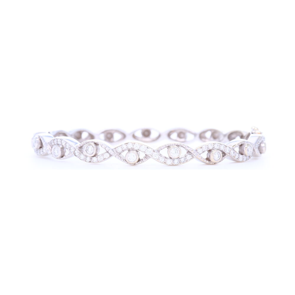 This Doris Panos Cleopatra bracelet is 18k white gold with 1.26 carats of diamonds. This unique and sexy bracelet is versatile for any occasion and any look. It can be worn along side other bangles or on its own, but either way remains timeless. Doris Panos Cleopatra Diamond Bracelet
