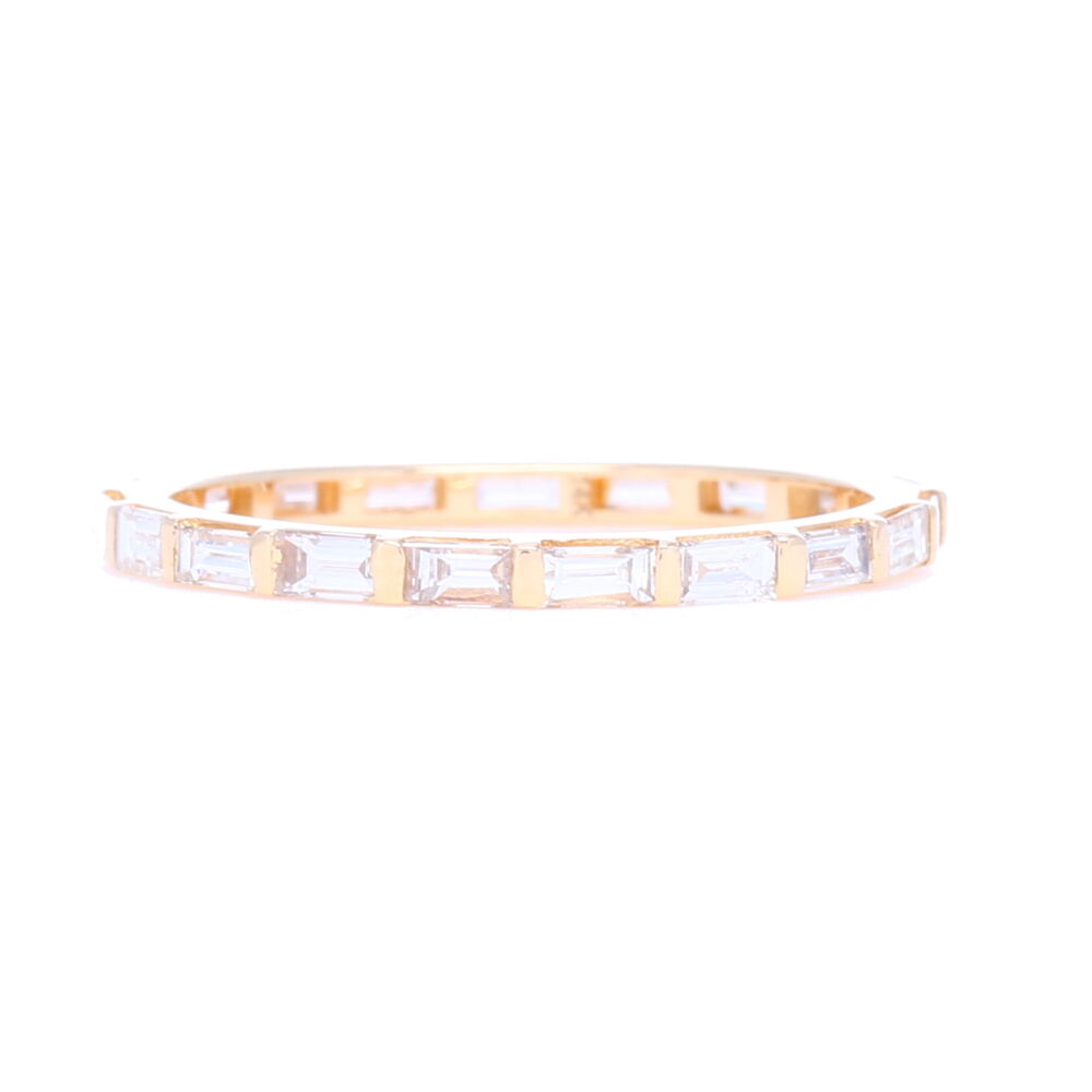 This size 7 step cut diamond eternity ring has .85 carats of diamonds and is made with 14k gold. Slim profile and super comfortable, perfect addition to adding dimension to any stack ring set. Inquire about price for rings smaller than a 5 or larger than a 9. 14k Yellow Gold Step Cut Diamond Eternity Stack Ring