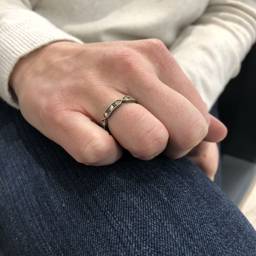 The Lizzie eternity band is handcrafted with 14k yellow gold, 15 champagne diamonds 0.71 tcw and rhodium sterling. Lizzie Diamond Eternity Band Ring