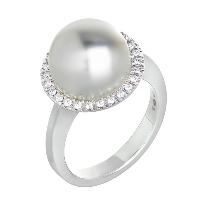 This 18k white gold pearl and diamond ring is the picture of elegance and grace. With one 11-12mm white south sea pearl and a halo of .16 carats of diamonds, this dazzling ring is perfect for a night out on the town and is bound to turn heads. 18K White Gold White South Sea Pearl and Diamond Halo Ring