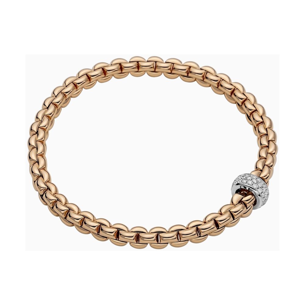 Flexible bracelet entirely made of 18 carat gold with white gold pave diamond rondels. Flex'it Bracelet with Pave Diamond Rondel 721BPAVE